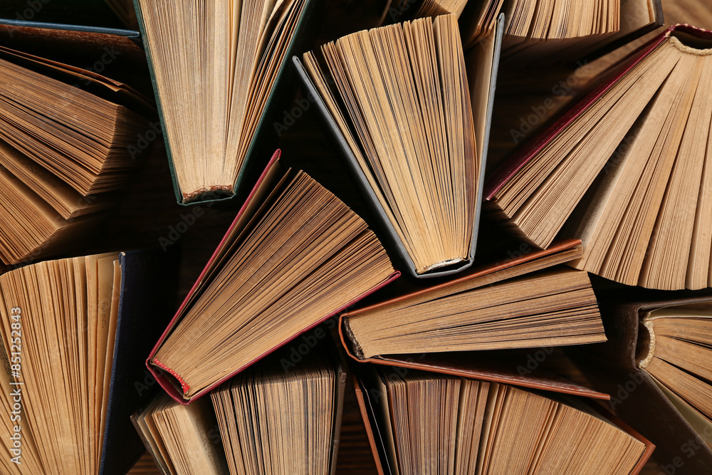 Fototapeta premium Pile of old hardcover books as background