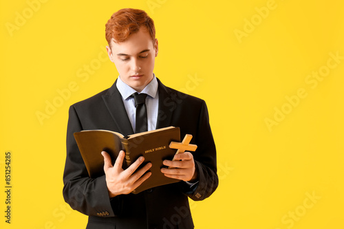 Young redhead man with wood...