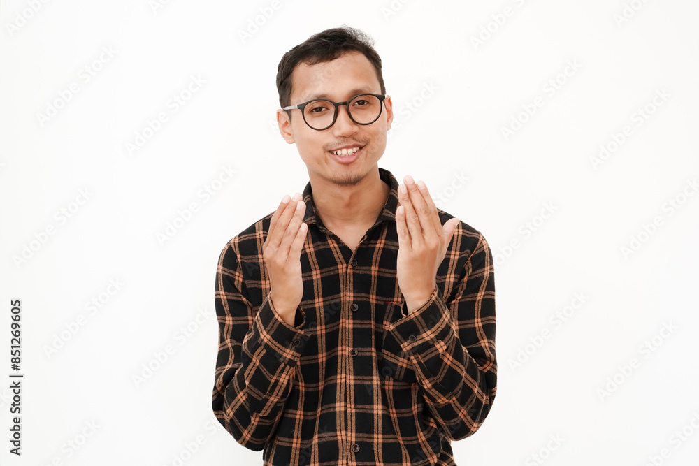 a young man wearing a flannel shirt, wearing glasses with an expression of gratitude, raising both hands (praying). With a plain white background a young man wearing a flannel shirt, wearing glasses with an expression of gratitude, raising both hands (praying). With a plain white background
