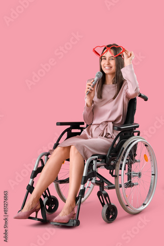 Young woman in wheelchair w...
