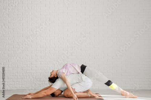 Sporty young couple practic...