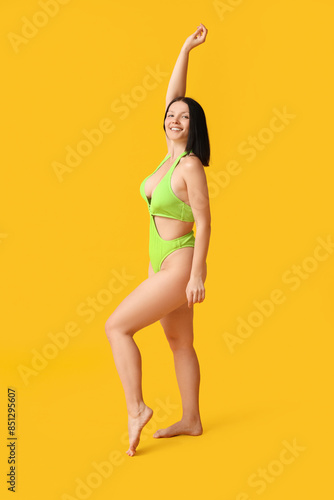 Beautiful young woman in st...