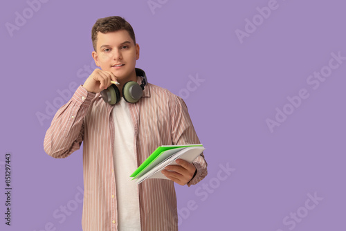 Teenage boy with headphones...