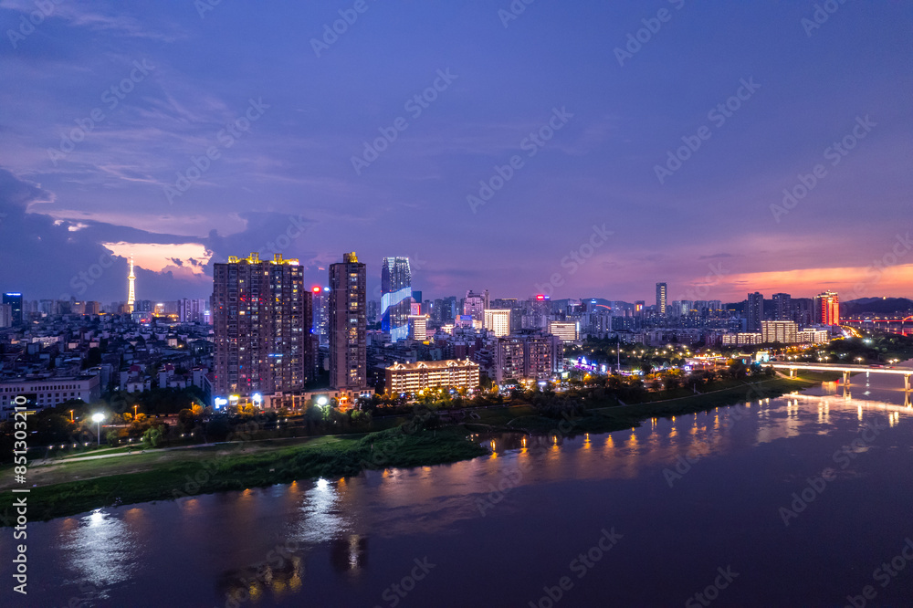 Obraz premium Aerial photography of the night scene of Hexi River Bank in Zhuzhou, China