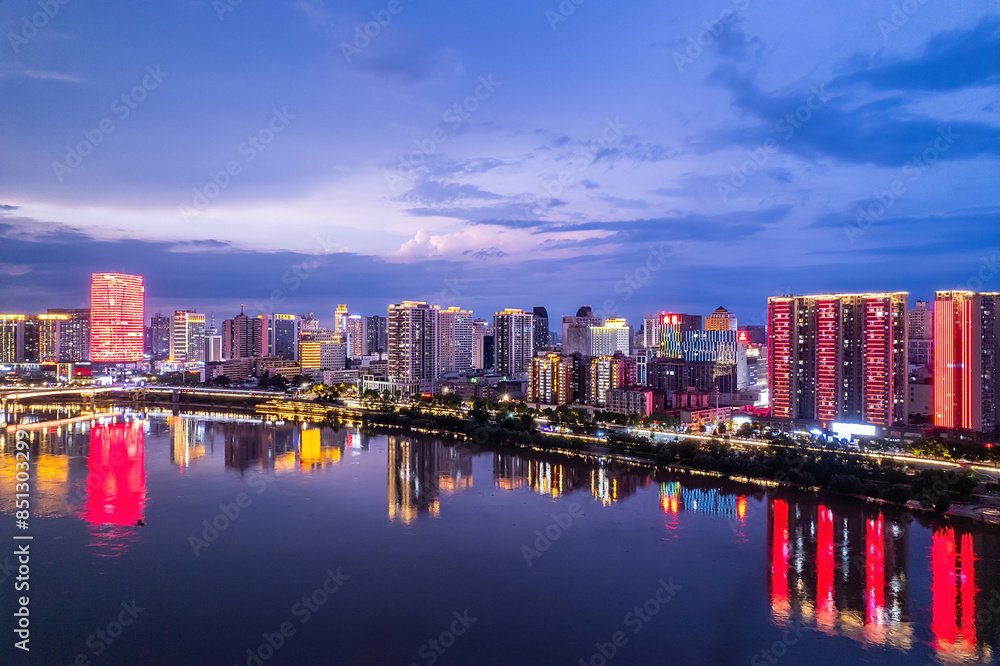 Obraz premium Aerial photography of the night scene on the east bank of the Xiangjiang River in Zhuzhou, China