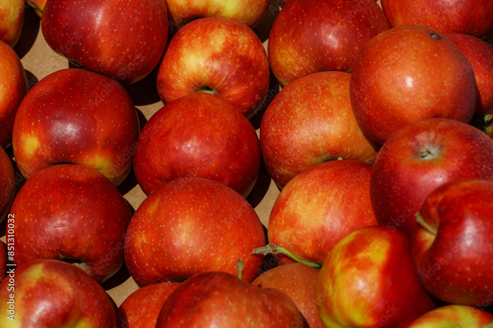 Apples in the fruit store. Fresh juicy fruits. Apple background. Apples in the fruit store. Fresh juicy fruits. Apple background.