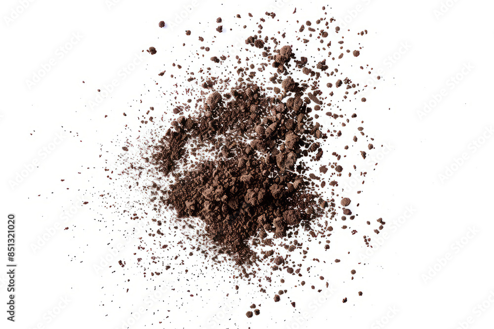 Scattered soil particles forming a starburst pattern in mid-air, set against a white backdrop Scattered soil particles forming a starburst pattern in mid-air, set against a white backdrop