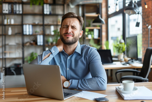 Pain in the neck muscle of Caucasian young man. Nape pain and nuchal stiffness concept.