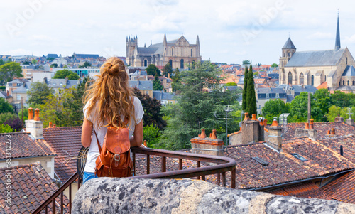 Woman tourist in Poitiers city landscape- France photo