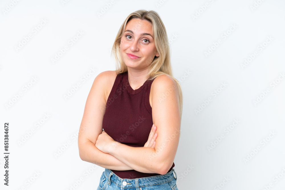 Young caucasian woman isolated on white background making doubts gesture while lifting the shoulders