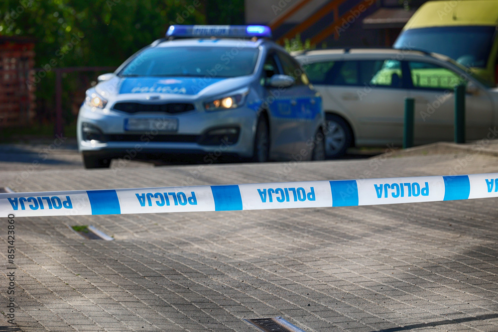 Miejsce przestępstwa - Taśma zabezpieczająca niebieska z napisem policja. Taśma policyjna. Miejsce przestępstwa - Taśma zabezpieczająca niebieska z napisem policja. Taśma policyjna.