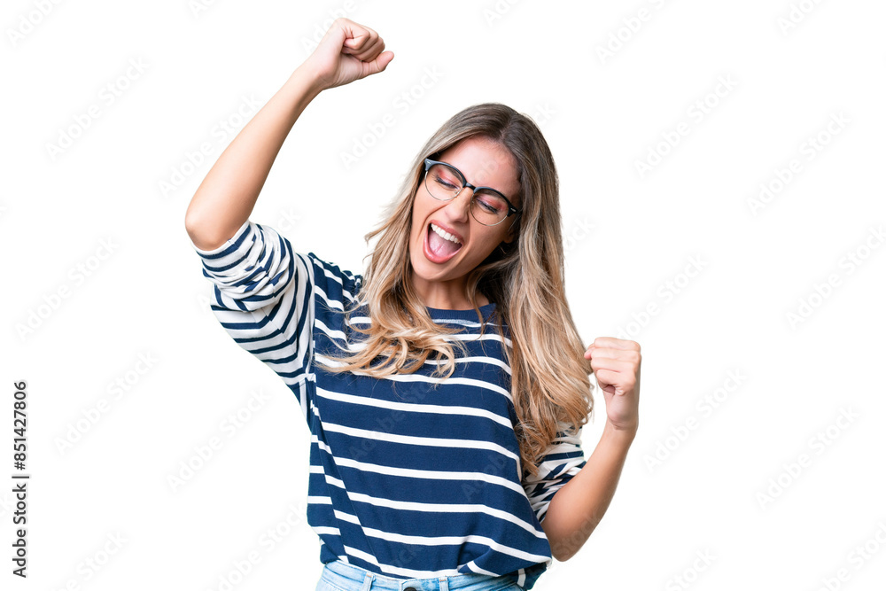 Young Uruguayan woman over isolated background celebrating a victory Young Uruguayan woman over isolated background celebrating a victory