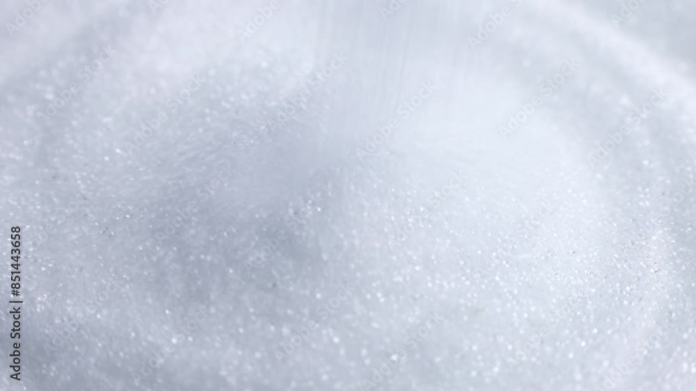 White natural organic sweet Erythritol sweetener granules falling down close up. Sugar substitute concept White natural organic sweet Erythritol sweetener granules falling down close up. Sugar substitute concept