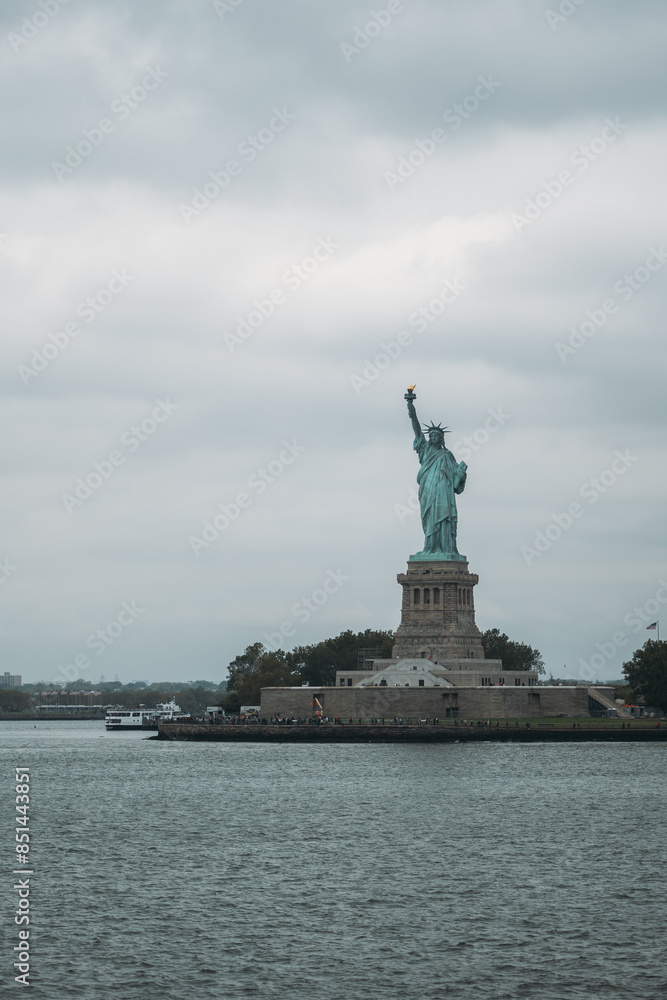 Statue of Liberty on a cloudy day in New York City Statue of Liberty on a cloudy day in New York City