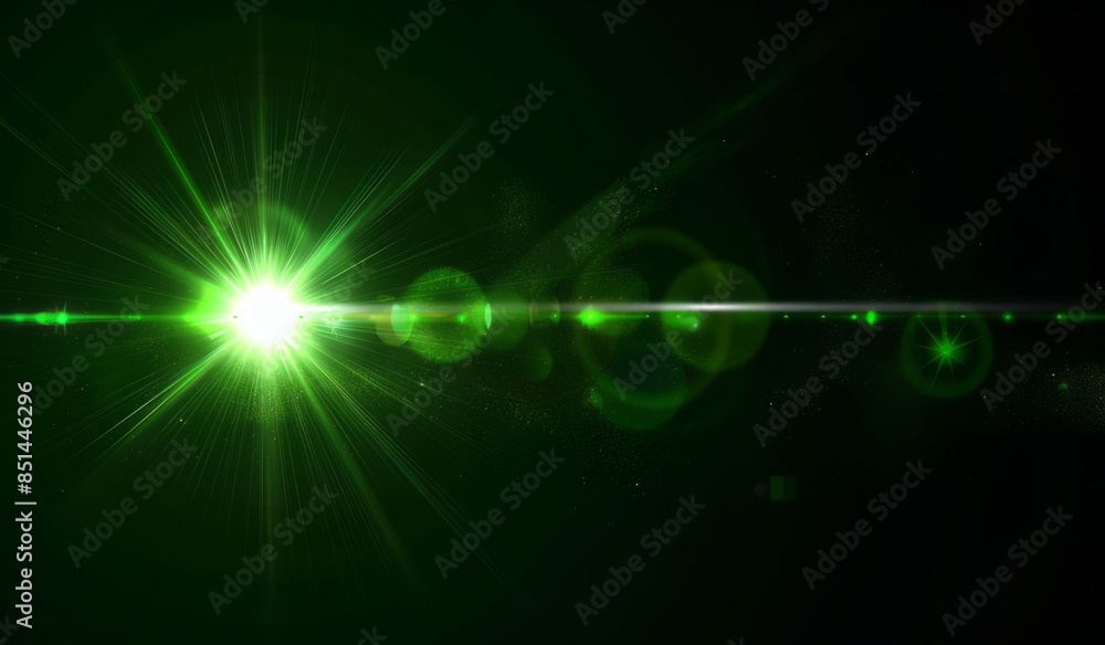 A glowing green light with lens flare on black background A glowing green light with lens flare on black background