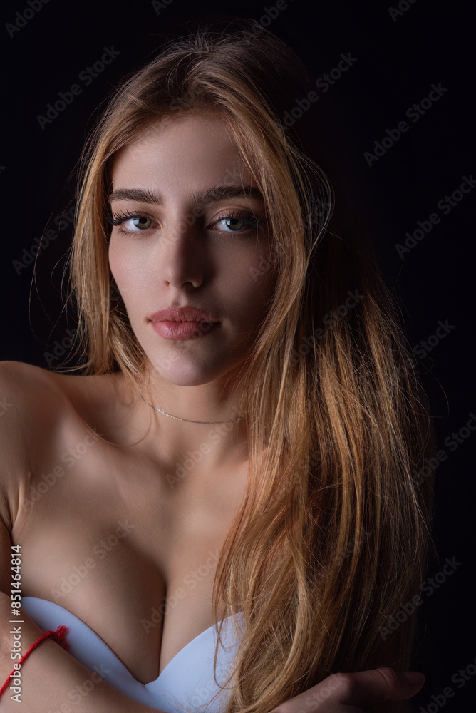 Beauty portrait of young blonde woman. Sexy model posing in studio. Portrait of beautiful girl. Beauty woman face closeup. Pretty girl portrait. Sensual look. Beautiful female portrait. Beauty portrait of young blonde woman. Sexy model posing in studio. Portrait of beautiful girl. Beauty woman face closeup. Pretty girl portrait. Sensual look. Beautiful female portrait.