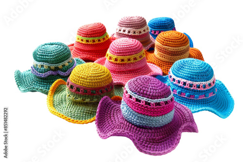 A group of colorful crochet sun hats isolated on a white background