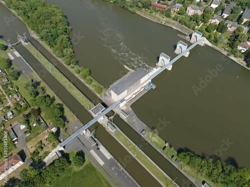 Griesheim dam, near Frankfurt am Main, Germany, lock hydroelectric power plant. Aerial view. photo