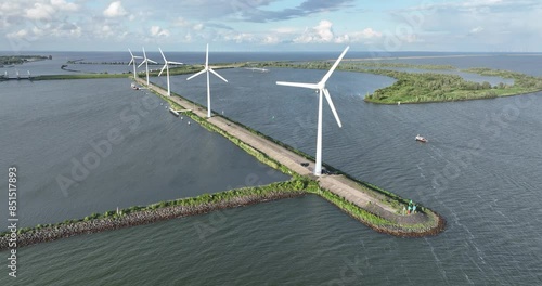 Generation of green sustainable wind energy. Wind turbines at Ijsselmeer, The Netherlands. photo