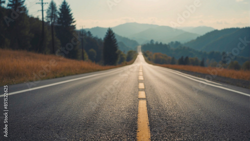 Empty open highway road through the forest, road leading towards to high mountains, journey travel background, copy space for text