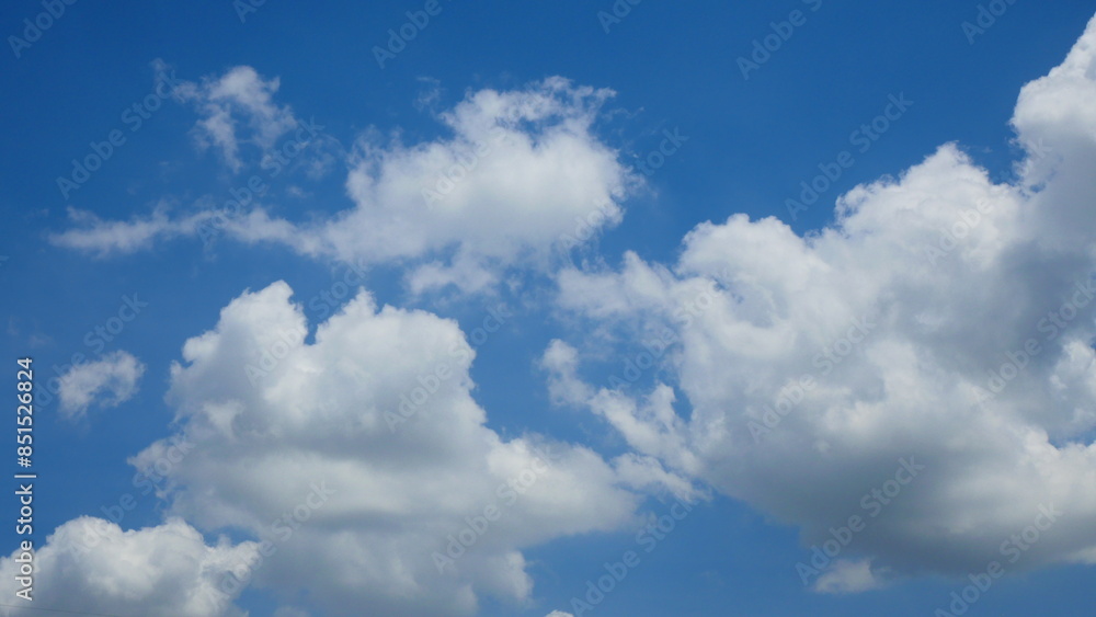 Bright blue sky and white clouds for use as the background Bright blue sky and white clouds for use as the background