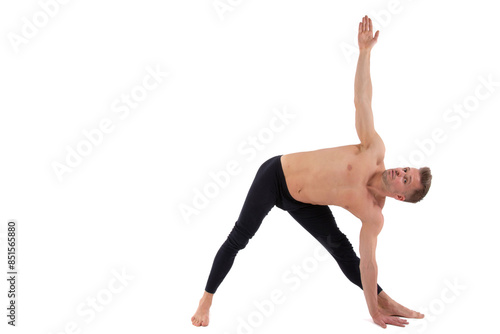 A young attractive man is doing yoga. White background.