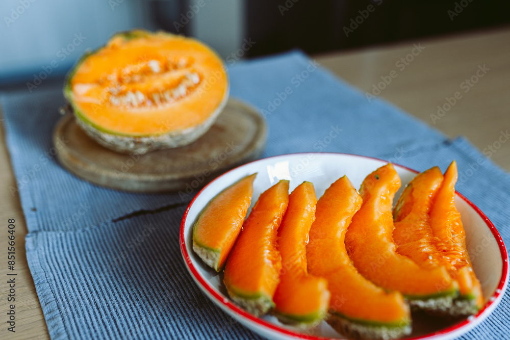 ripe melon cut on a plate