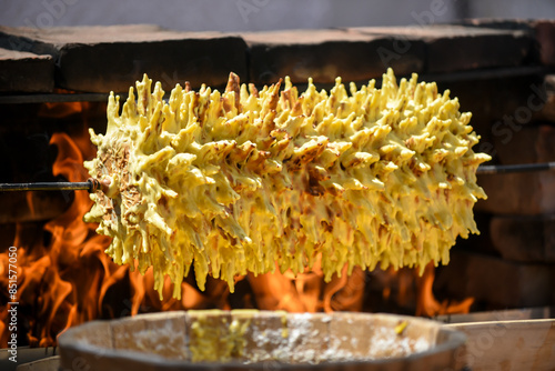 The process of making traditional Lithuanian tree cake