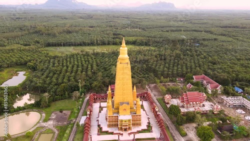 Drone video, high angle, Wat Mahathat Wachira Mongkhon (Wat Bang Thong), Krabi Province, 46 Moo 3, Na Nuea Subdistrict, Ao Luek District, Krabi 81110 Thailand. photo