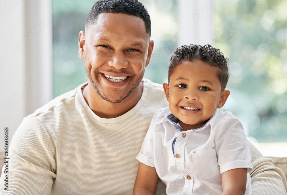Boy, father and portrait on sofa with love, smile and bonding with affection on weekend for safety or security. Dad, son and home in living room with trust or hug, together and relax with care or joy Boy, father and portrait on sofa with love, smile and bonding with affection on weekend for safety or security. Dad, son and home in living room with trust or hug, together and relax with care or joy