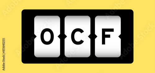 Black color in word OCF (Abbreviation of Operating cash flow) on slot banner with yellow color background