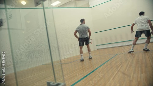 Squash game as seen through the glass