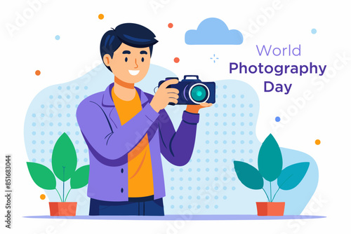  A skilled photographer holding a camera in hand, stands against a dotted white backdrop. World photographer day
