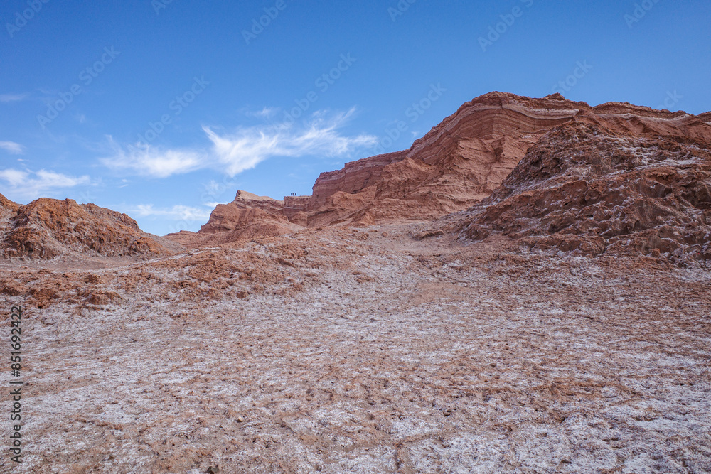 Fototapeta premium San Pedro de Atacama, Chile - Nov 29, 2023: Sand dunes and rock formations in the Valley of the Moon, Atacama Desert