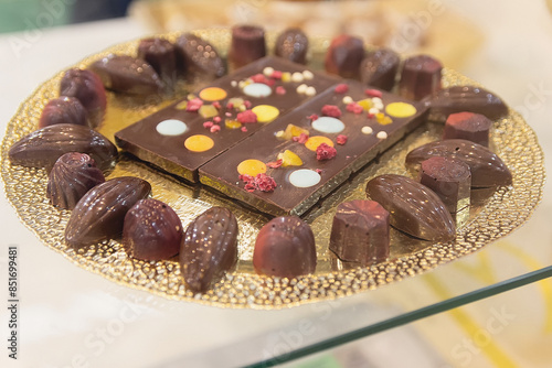 Luxurious chocolates on a store window. Sweets photo