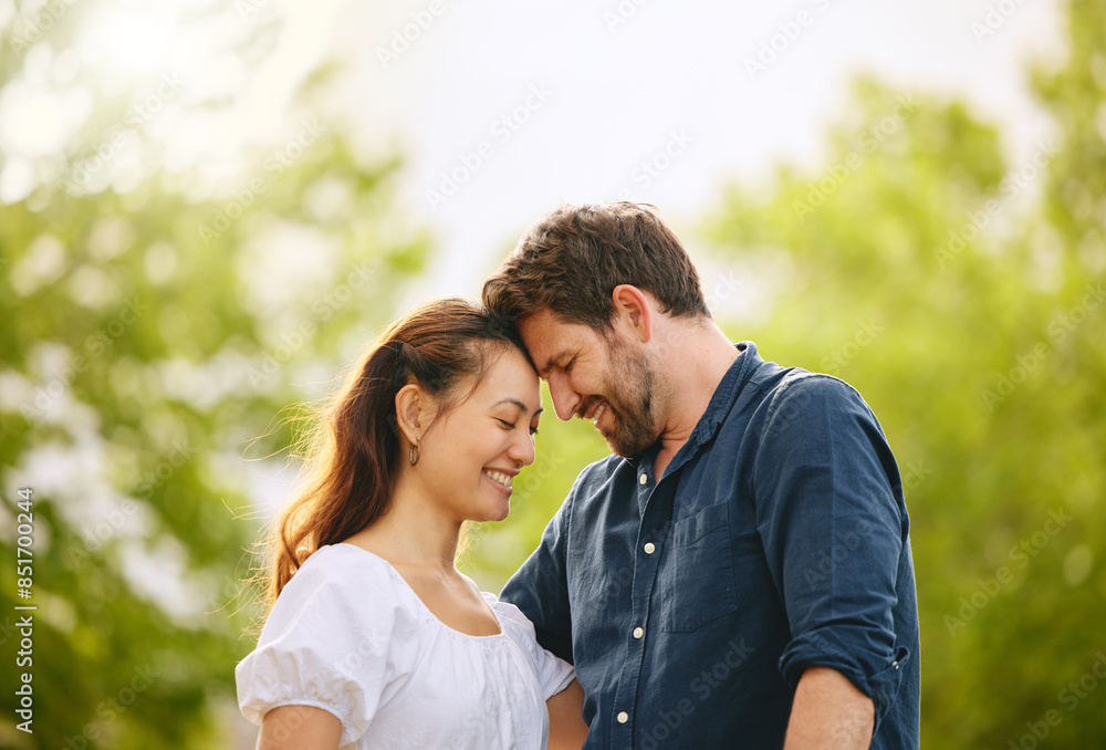 Couple, forehead touch and love in garden, connection and romance in relationship or affection. People, security and smile for commitment to marriage in outdoor nature, support and weekend date Couple, forehead touch and love in garden, connection and romance in relationship or affection. People, security and smile for commitment to marriage in outdoor nature, support and weekend date