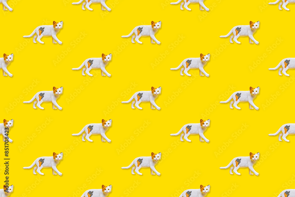 Cat toy on a yellow background pattern. Cat toy on a yellow background pattern.