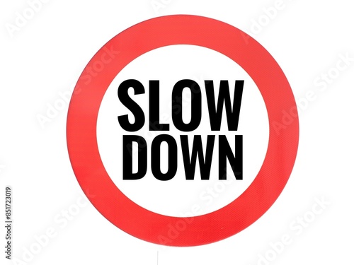 Free Download A sign with a red circle and the words 'Slow Down,' serving as a warning to drivers to reduce their speed for safety reasons and to avoid potential dangers - GFXLoad