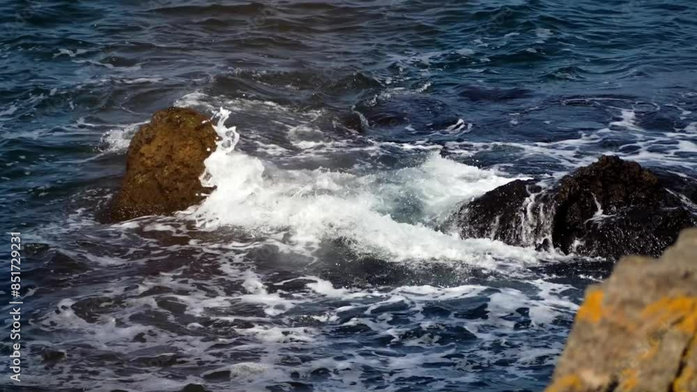 Sea waves beating from picturesque rocks and stones near the Bulgarian shore of the Black Sea. Sea waves beating from picturesque rocks and stones near the Bulgarian shore of the Black Sea.