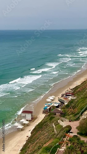Top view of the seashore and beach from the hotel window