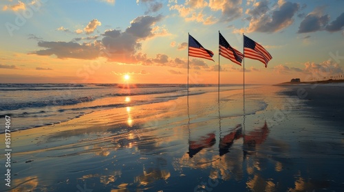 American flags on the beach at sunset