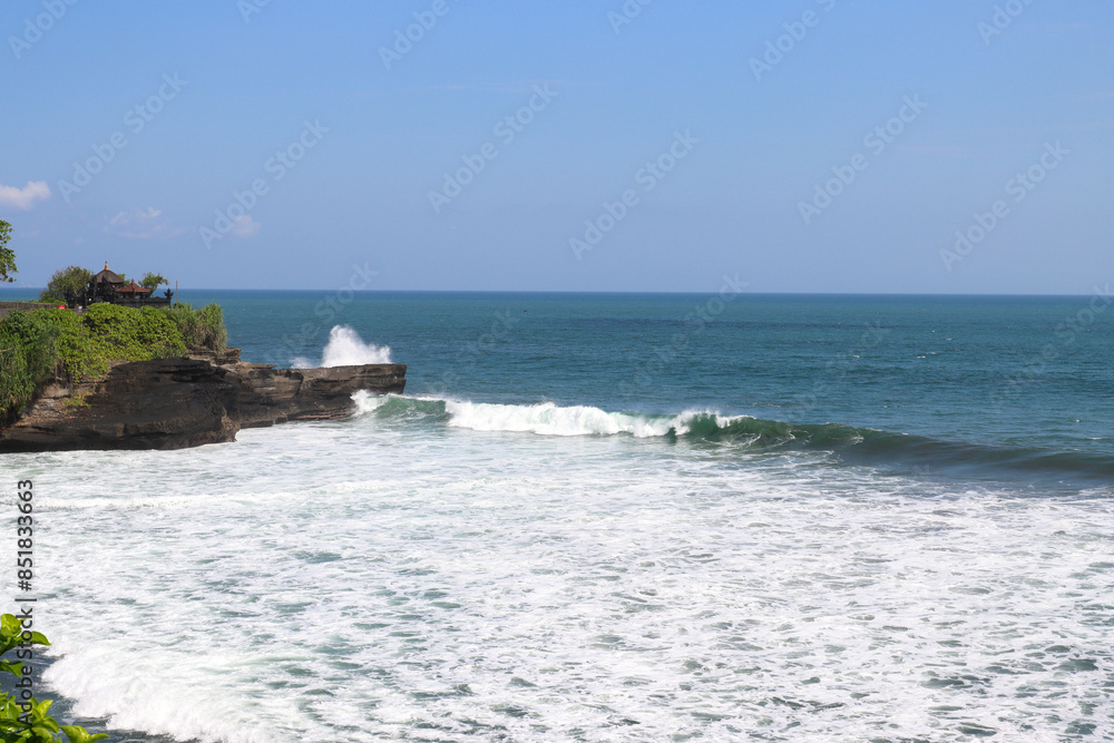 Waves crushing on the Tanah Lot temple rocks Waves crushing on the Tanah Lot temple rocks