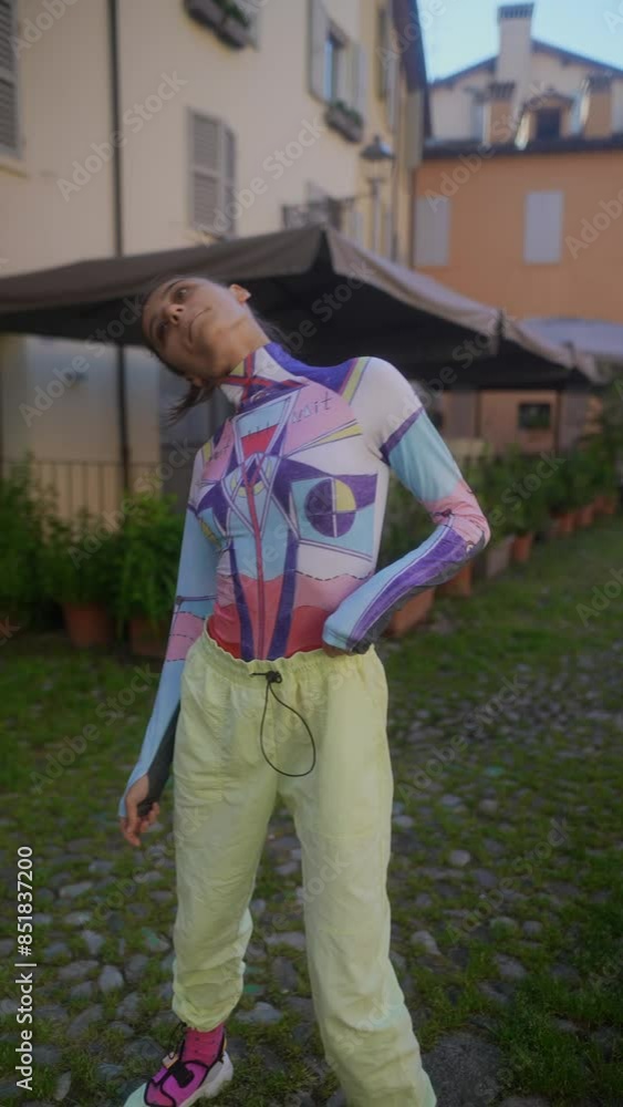 Fashion portrait of a stylish woman in a unique outfit, showcasing vibrant urban street style