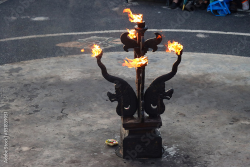 Burning candle in Uluwatu amphiteater  photo