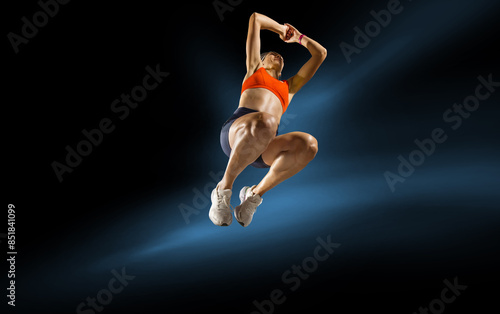 Sport backgrounds. The woman with jump runner. Isolated scene.	