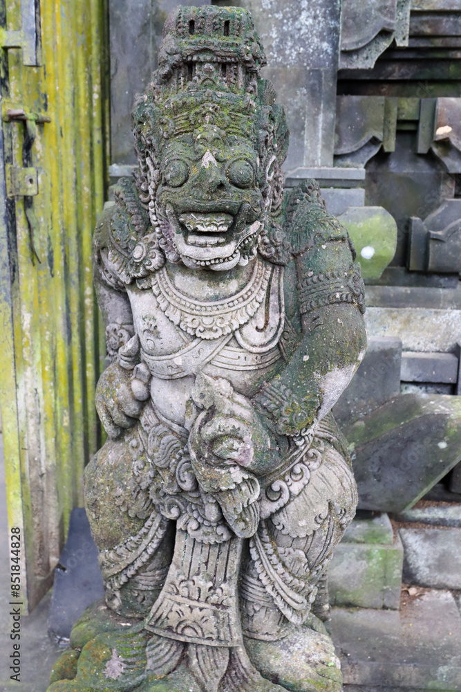 Stone stautue in Ubud Water temple Stone stautue in Ubud Water temple