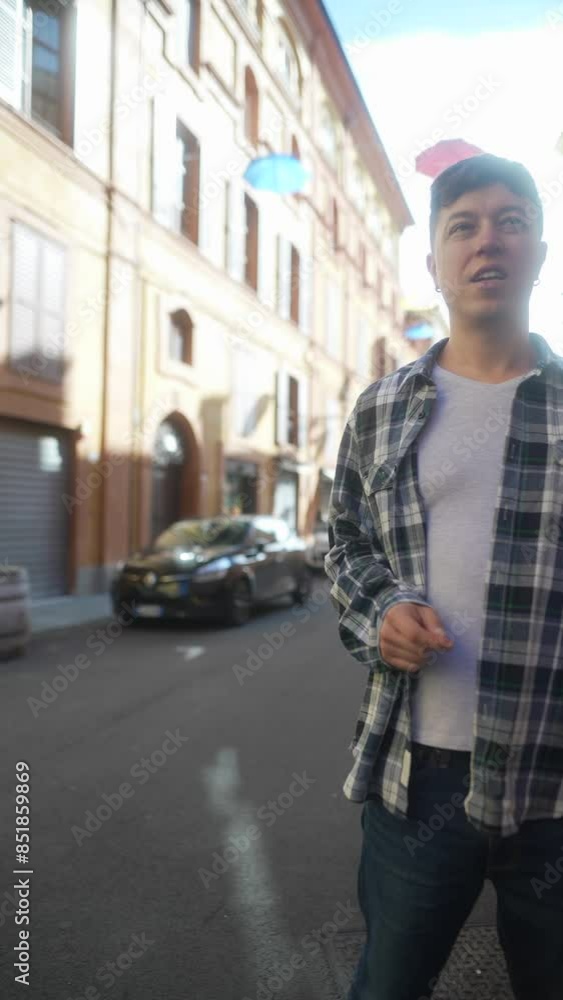 Enjoy a leisurely walk in the city with a young man, embracing the casual urban vibe Enjoy a leisurely walk in the city with a young man, embracing the casual urban vibe
