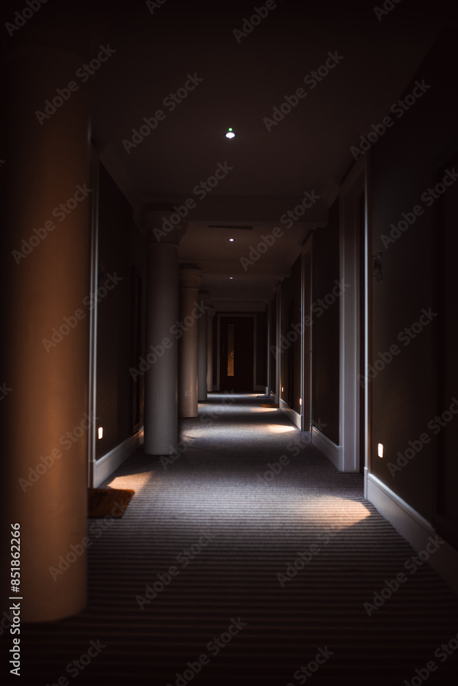 Long dark corridor in hotel building in York, Yorkshire, UK