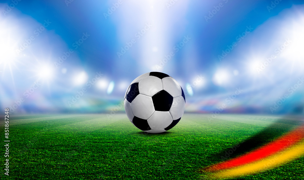 Fototapeta premium Fußball im einer Fussballarena im Scheinwerferlicht 2024