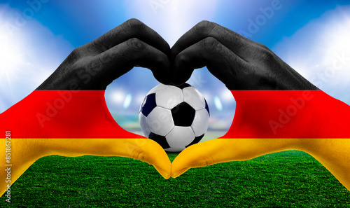 Fußball im einer Fussballarena im Scheinwerferlicht 2024
